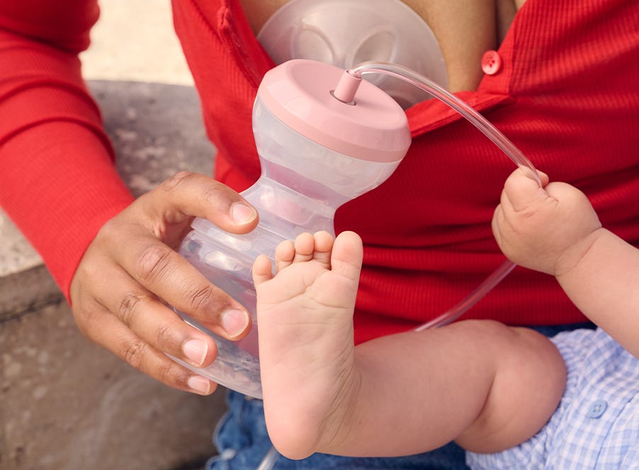 a mum using a tommee tippee breast pump