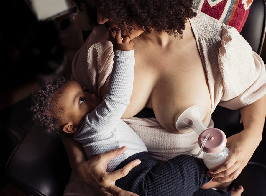 a mum breastfeeding her baby
