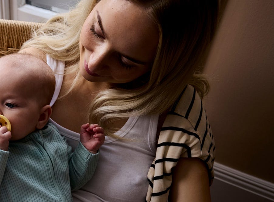 a mum looking at her baby