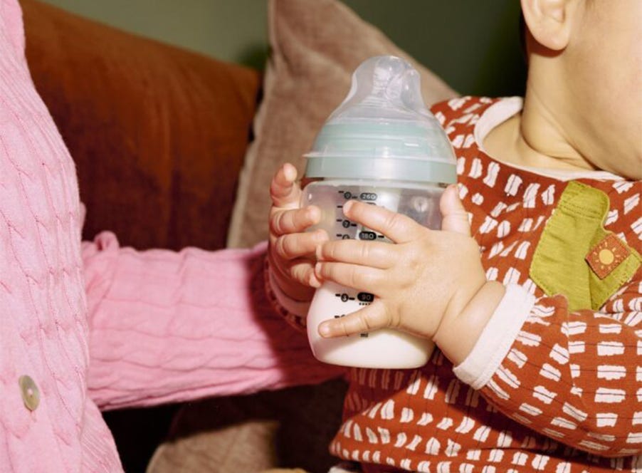 a baby bottle feeding