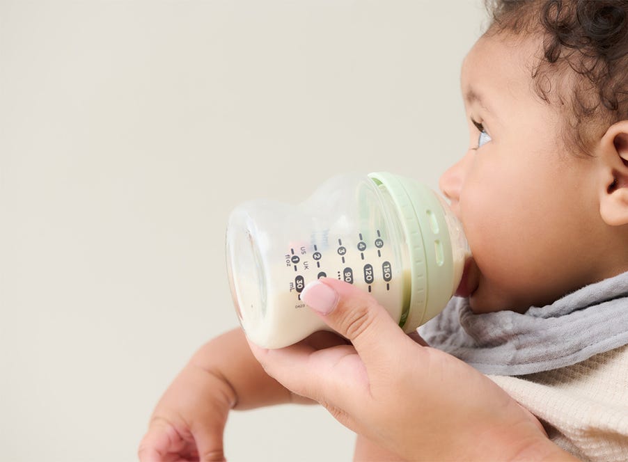 a baby bottle feeding