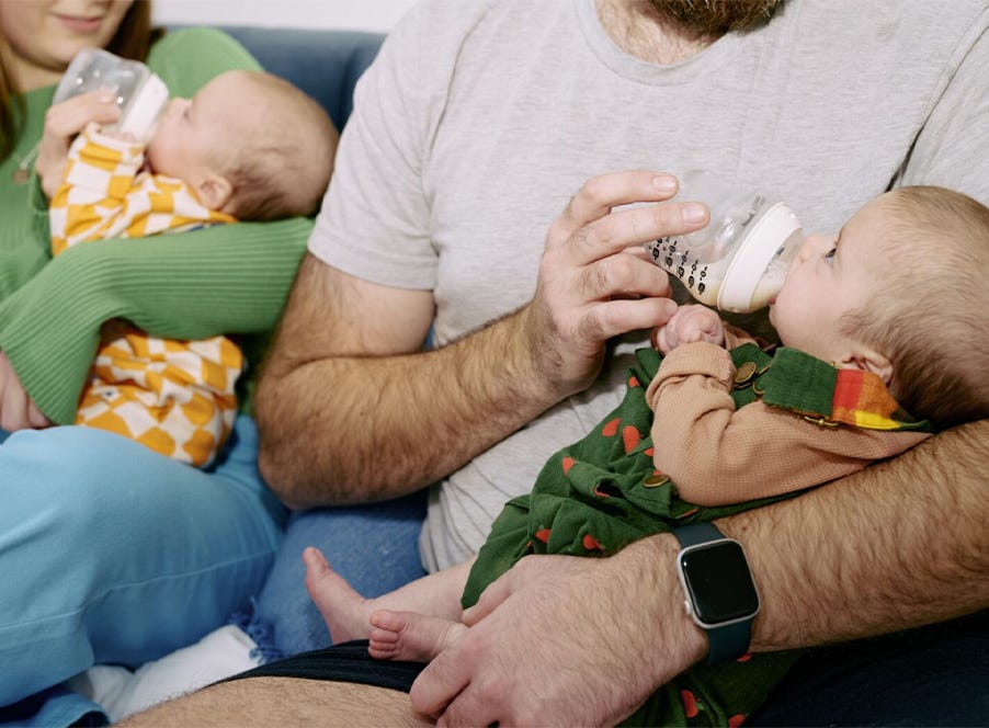 twins bottle feeding