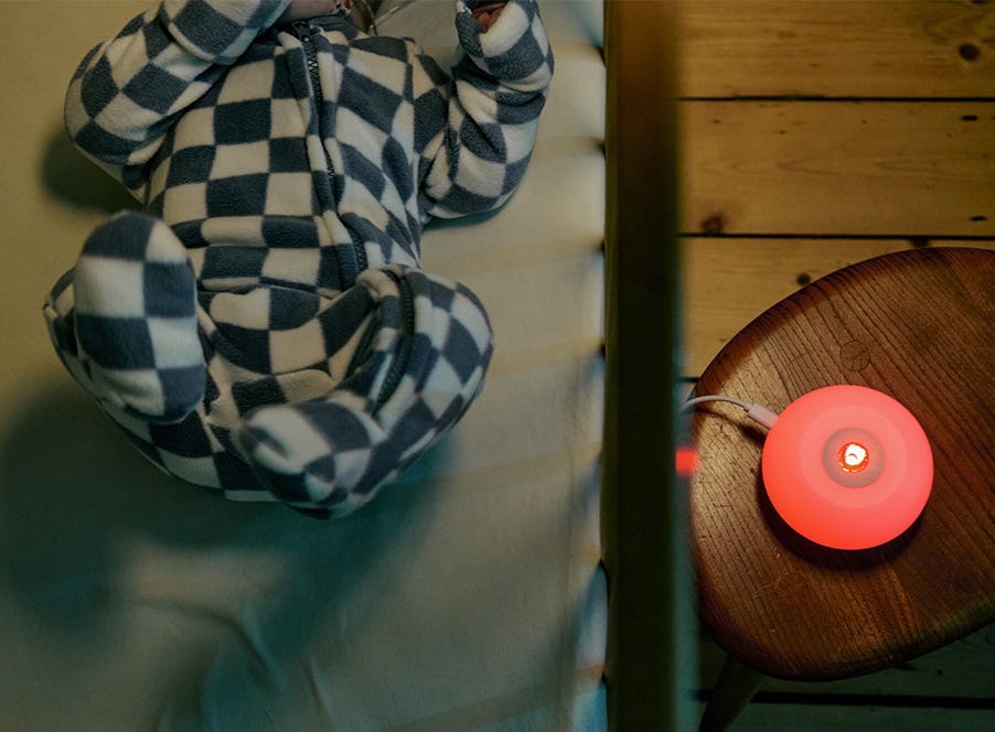 a baby in their cot