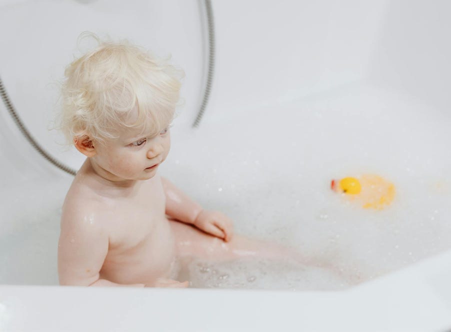 a baby having a bath