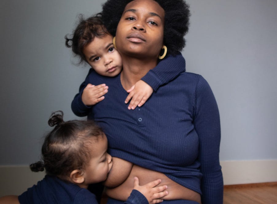 a mum breastfeeding her baby