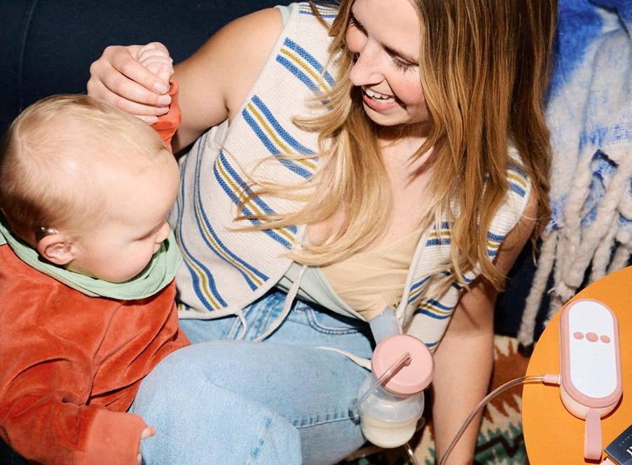a mum using a tommee tippee breast pump