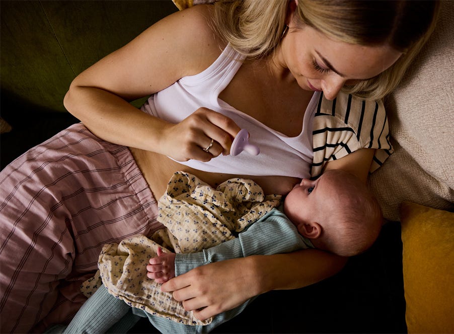 a baby breastfeeding