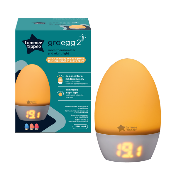 Groegg gris à côté de son emballage sur fond blanc