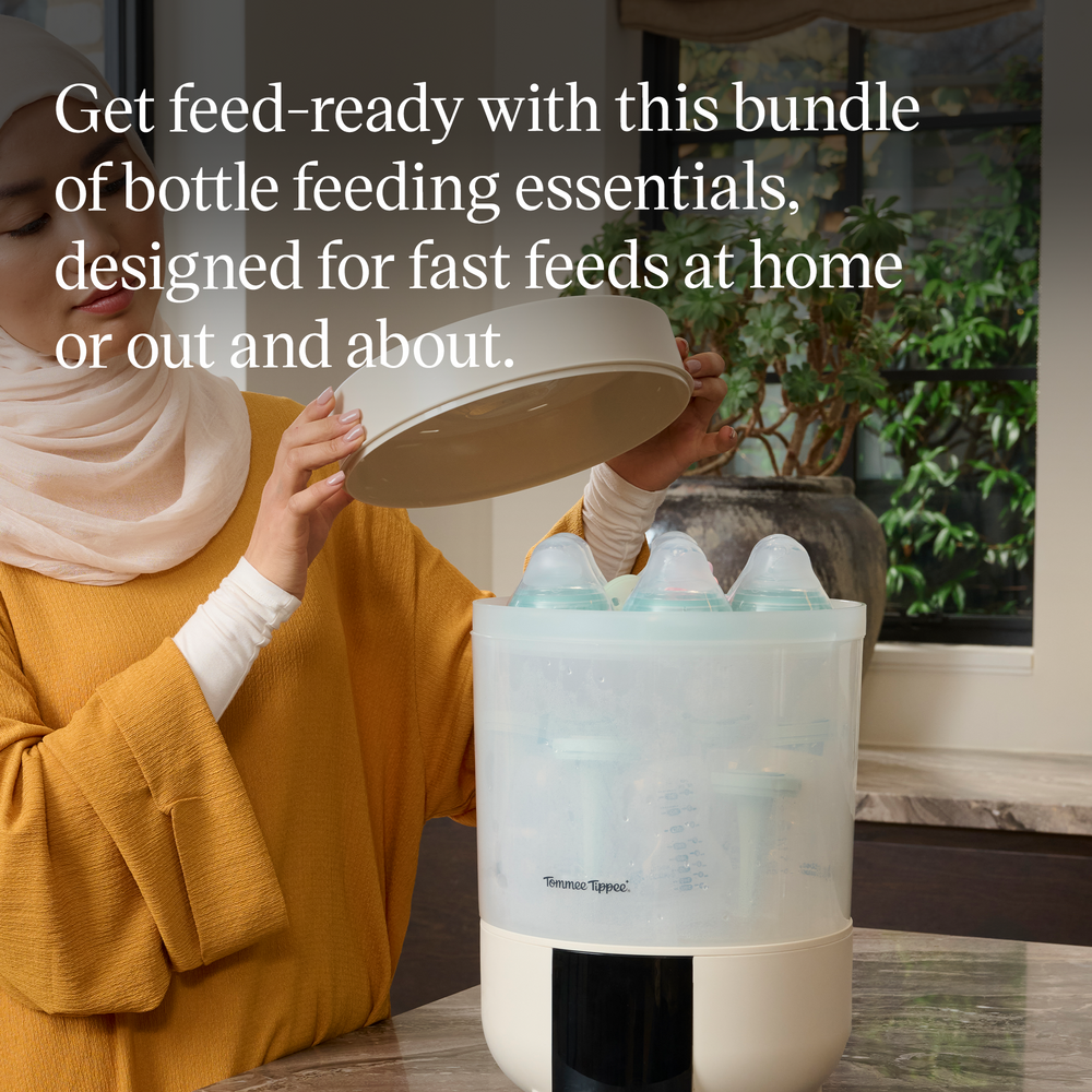 Woman loading a Tommee Tippee QuickDry steriliser with bottles and text overlay stating “Get feed-ready with this bundle of bottle feeding essentials, designed for fast feeds at home or out and about.” 
