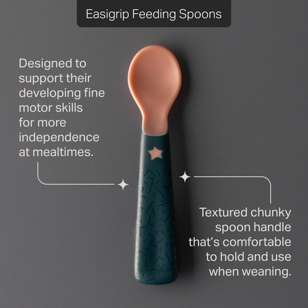 Tommee Tippee easigrip feeding spoon against a grey background with pointers to product features stating “Designed to support their developing fine motor skills for more independent mealtimes.” and “Textured chunky spoon handle that’s comfortable to hold and use when weaning.” 