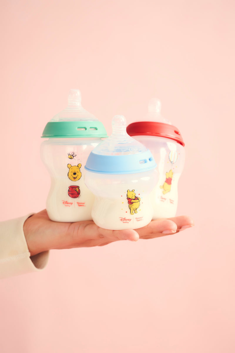 hand holding bottles