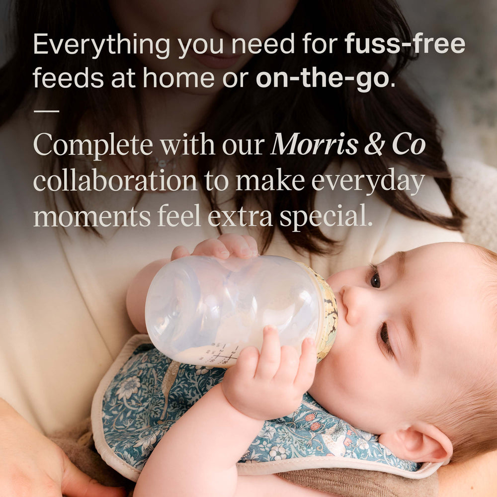Baby feeding from a Tommee Tippee x Morris & Co Natural Start bottle with text overlay stating “Everything you need for fuss-free feeds at home or on-the-go. Complete with our Morris & Co collaboration to make everyday moments feel extra special.” 