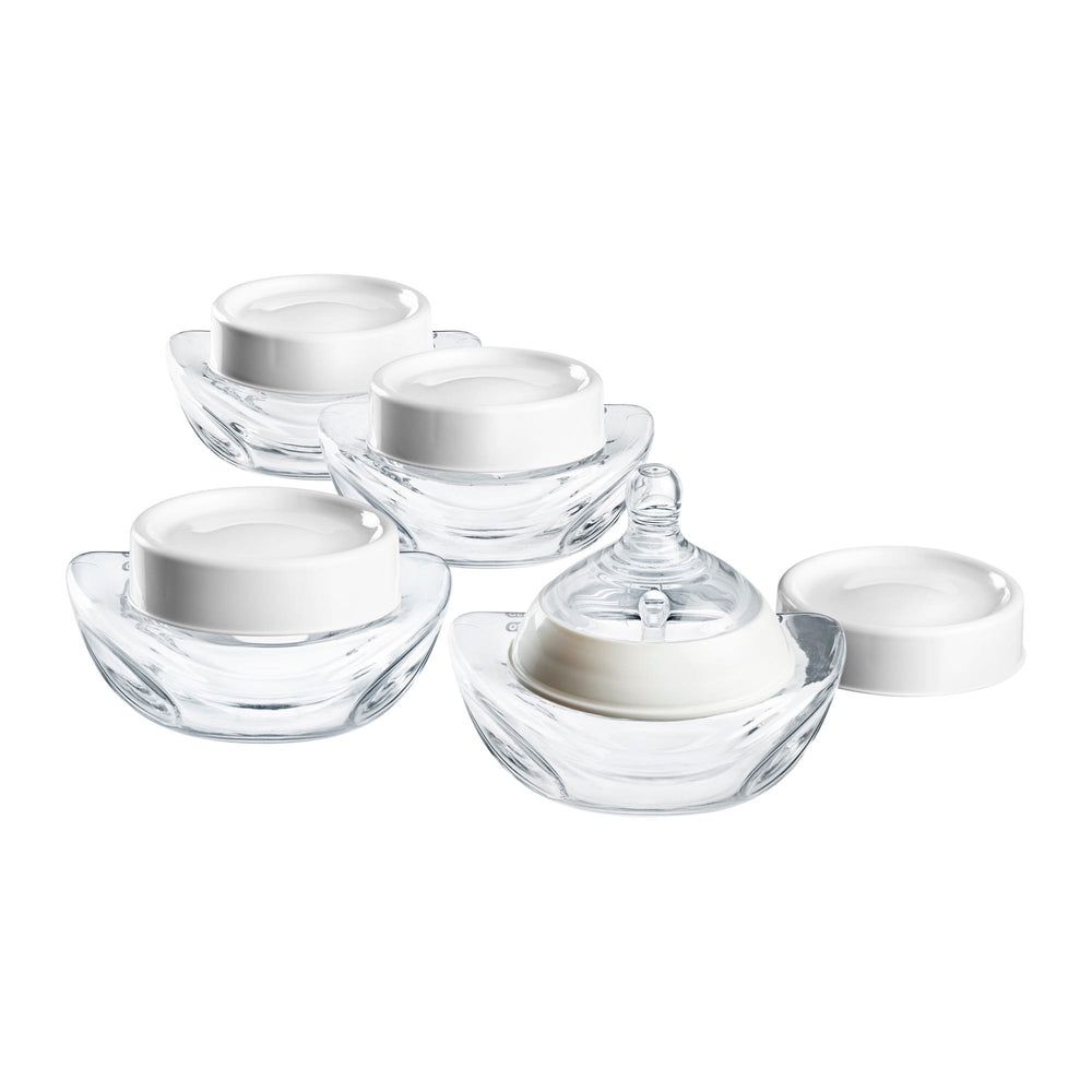 4 bouteilles de lait sur fond blanc