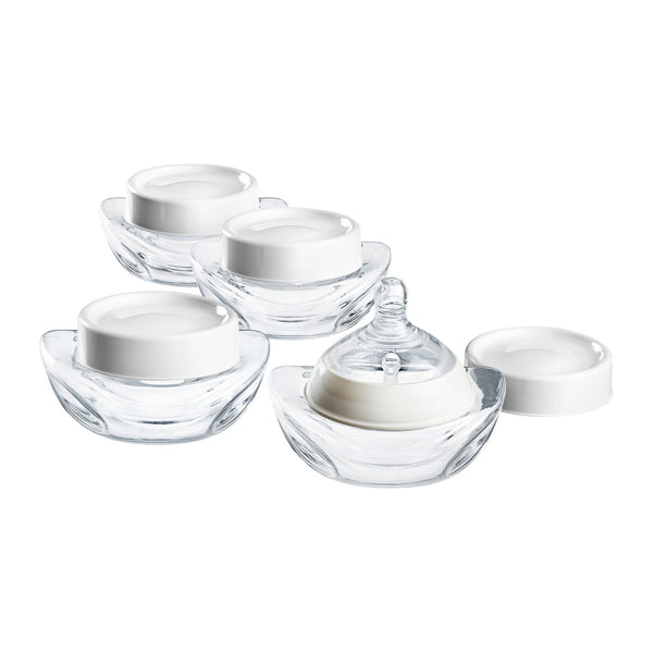 4 bouteilles de lait sur fond blanc