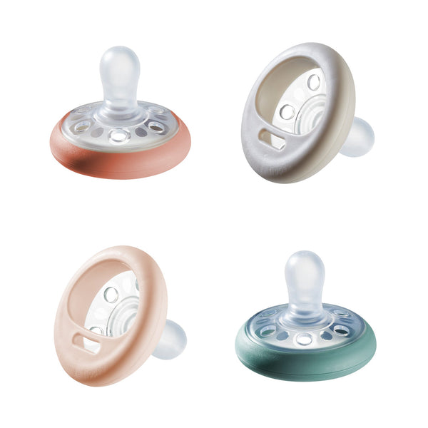 Pacifiers on a white background
