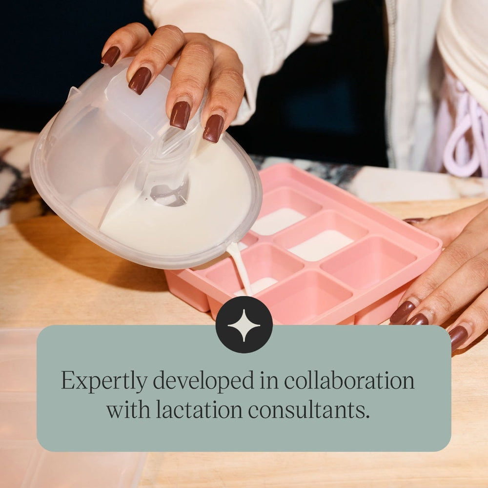 Parent pouring breast milk from the wearable pump into an ice cube tray with overlay 