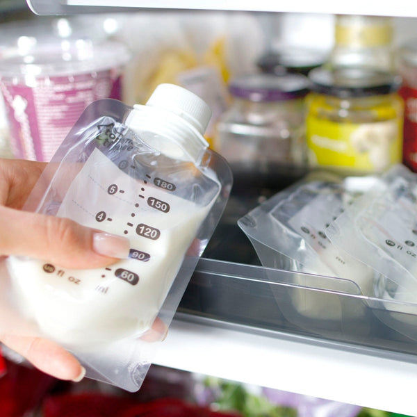 inserting-milk-pouch-into-the-fridge