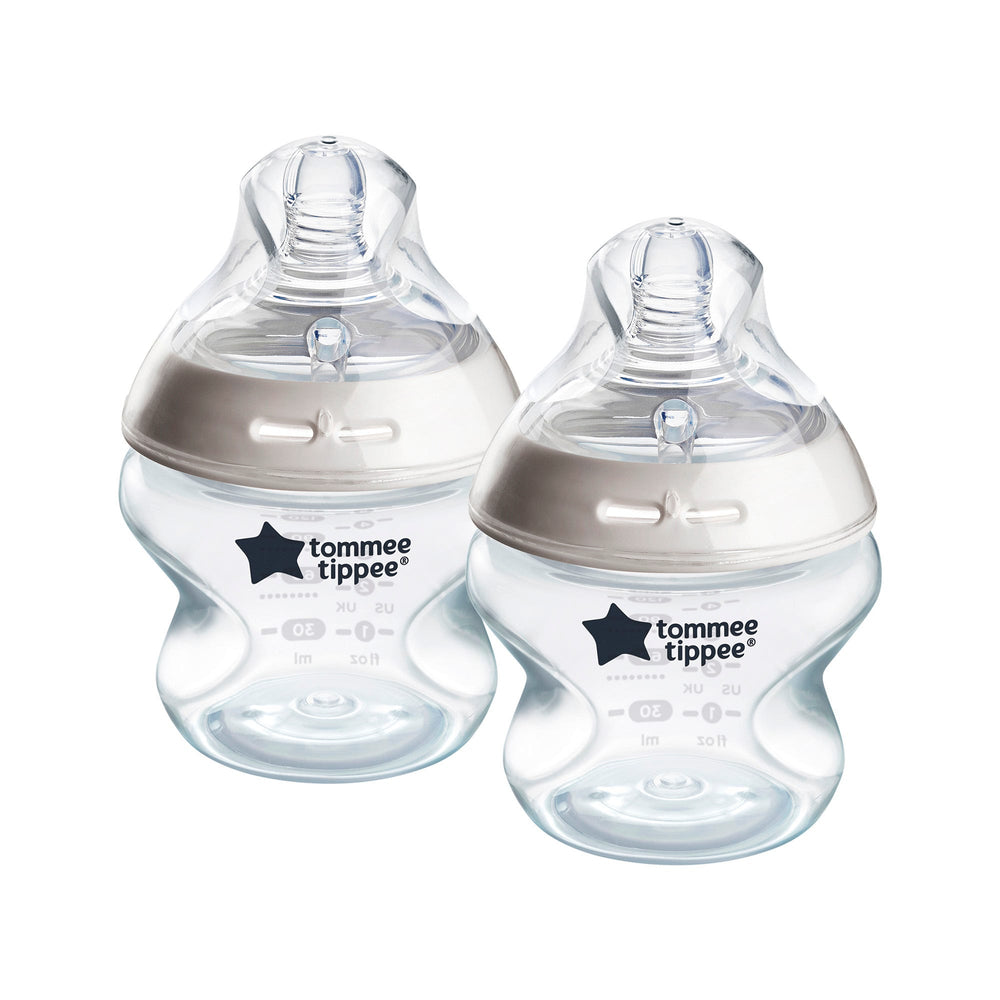 Natural Start baby bottles on a white background