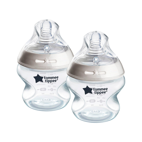 Natural Start baby bottles on a white background