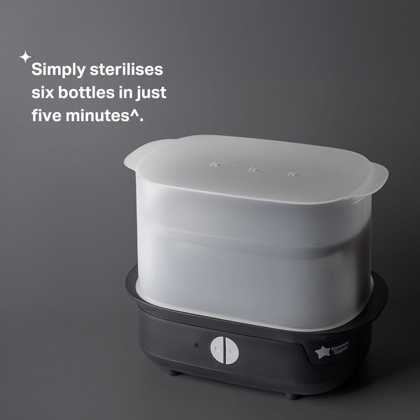 Black steam steriliser against a grey background with product USP tagline