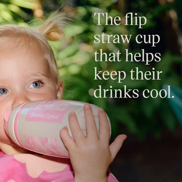 Toddler drinking from a pink camo insulated straw cup with product USP tagline alongside