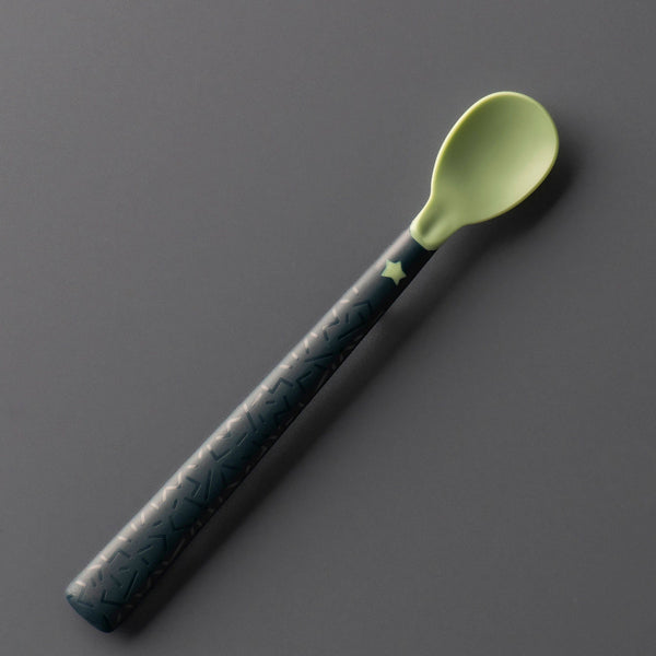 Softee weaning spoon on a grey background
