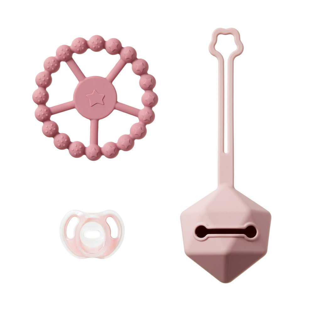 Contenu d'un coffret cadeau confort en silicone sur fond blanc.