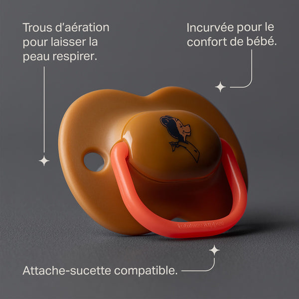Apaisant bronzant sur fond gris avec des pointeurs vers les principales caractéristiques du produit
