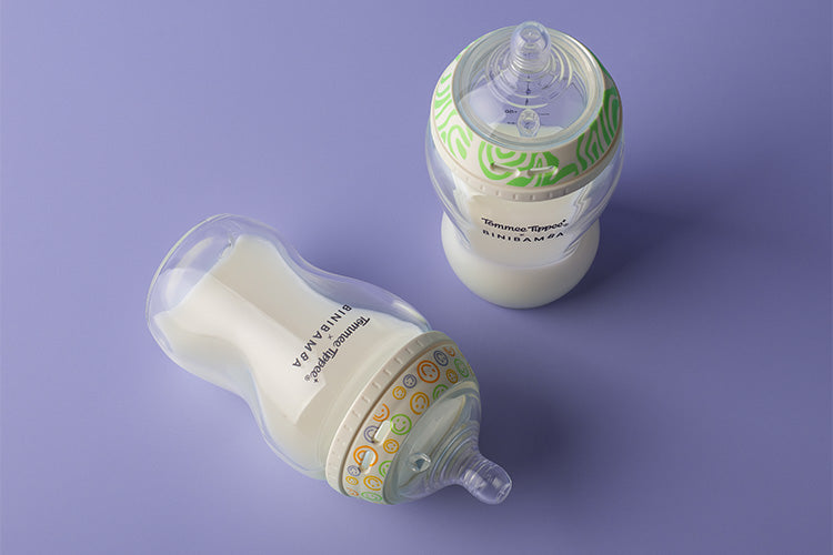 Tommee Tippee x Binibamba Natural Start Bottles on purple background