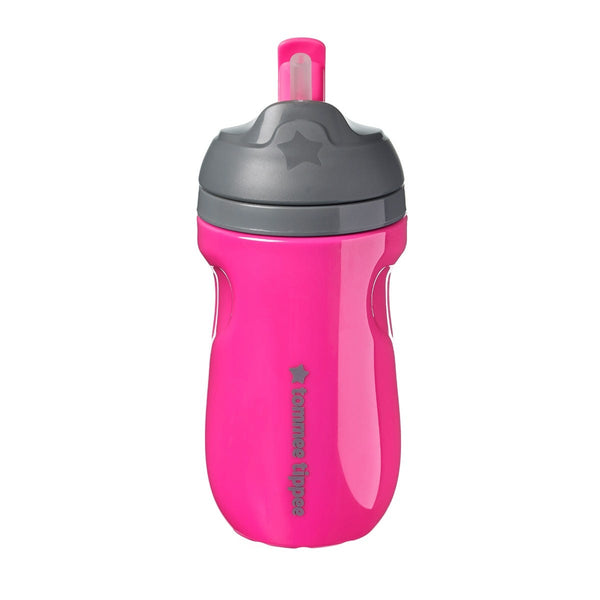 Pink straw cup against a white background
