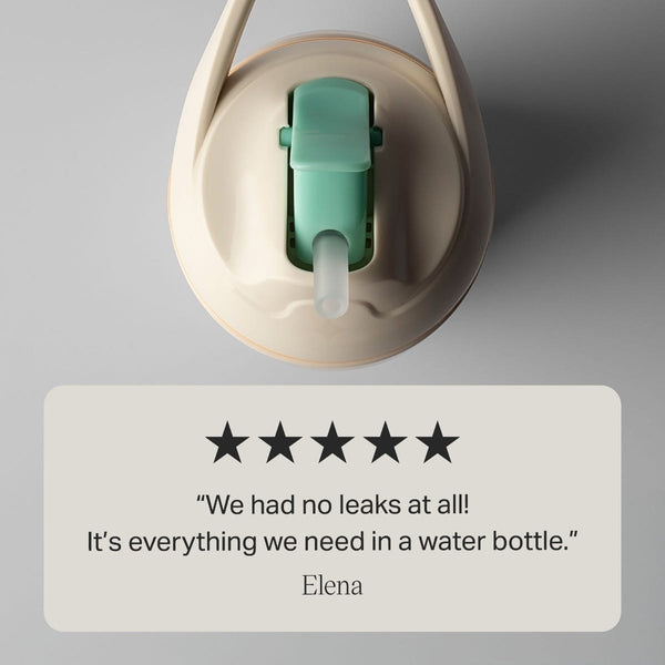 Aerial shot of insulated sporty straw cup against a grey background with text overlay of a customer review