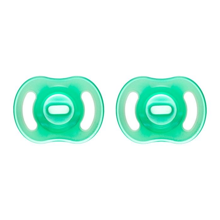 Ultra-light Night Glow soothers on a white background.