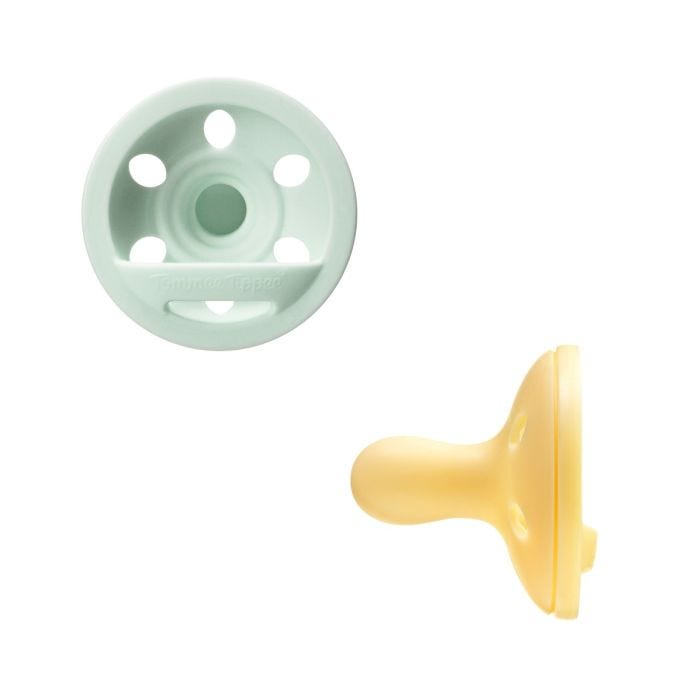 Breast-like soothers on a white background.