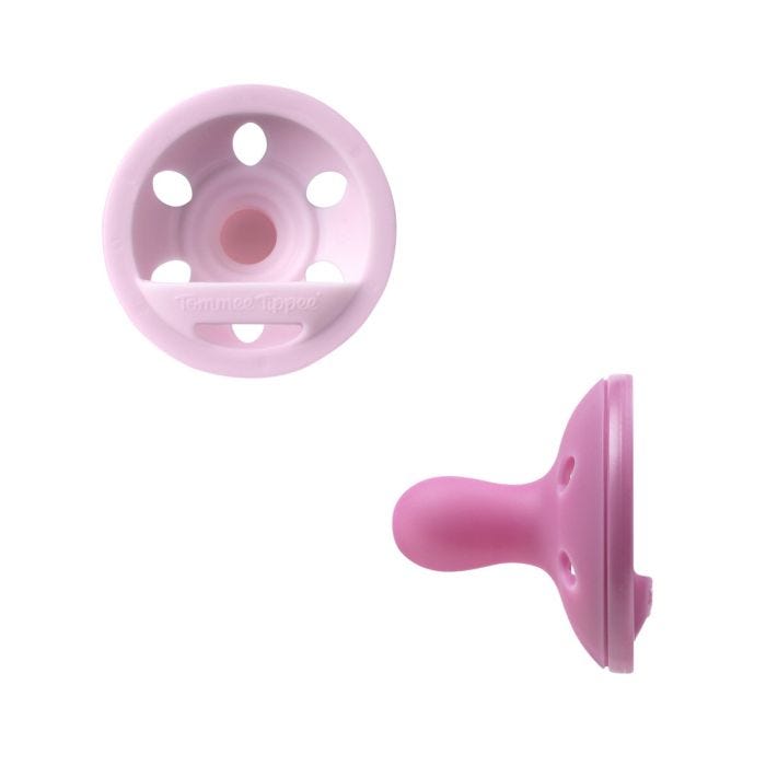 Breast-like soothers on a white background.