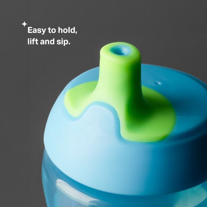 Sporty Spout bottle on dark grey background with product USP tagline