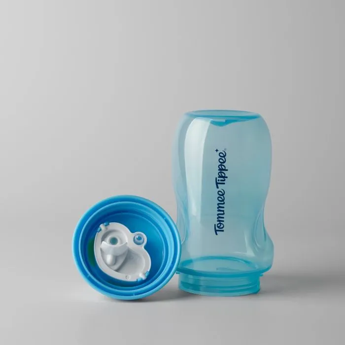 Sporty Spout bottle base with lid next to it showing the two-piece valve against a light grey background