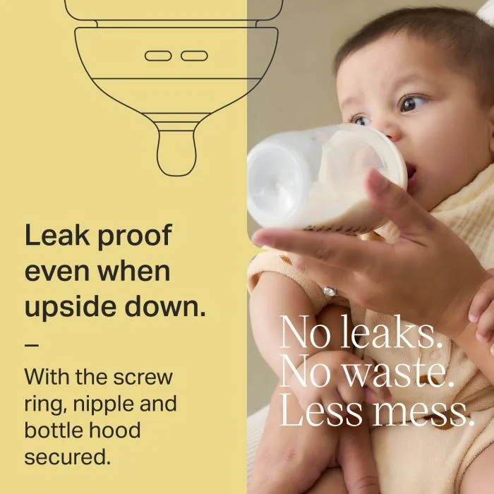 Baby drinking from a Natural Start baby bottle