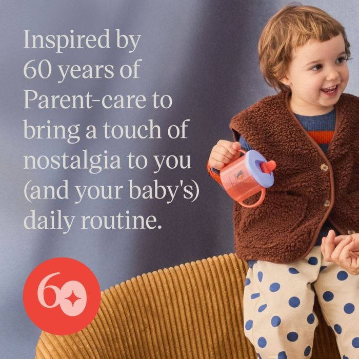 Toddler holding a pink First Cup against a blue background with bundle USP tagline 