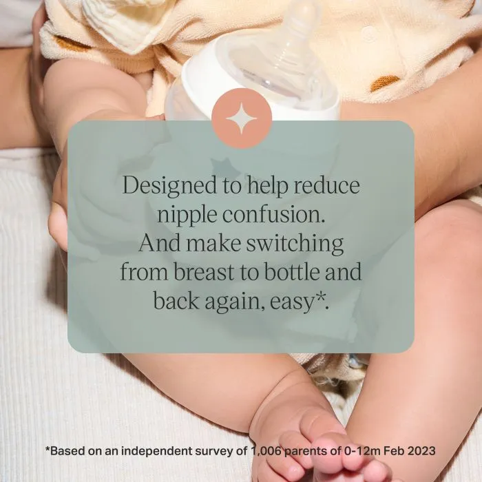 Baby sat on the floor holding a Natural Start bottle with text overlay of product messaging