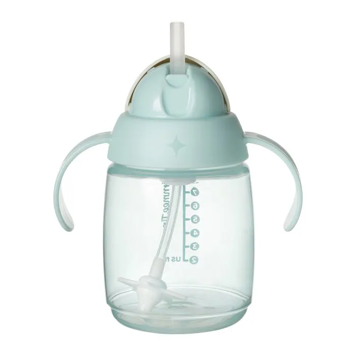 Green starter straw cup against a white background