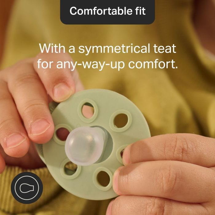 Close-up of a baby showing the symmetrical teat and silicone shield.
