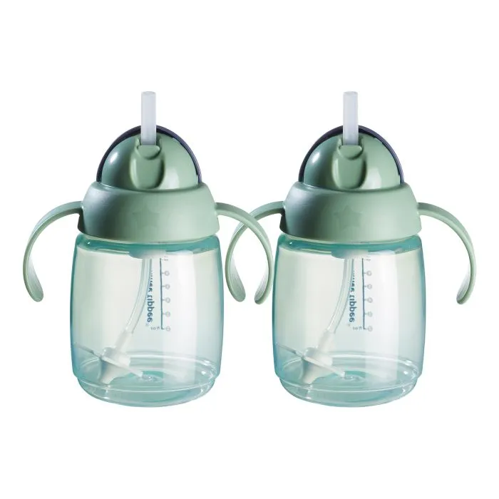 Green weighted straw cup against a white background
