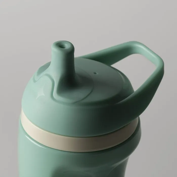 Close up of the spout on a teal insulated sporty spout cup against a light grey background