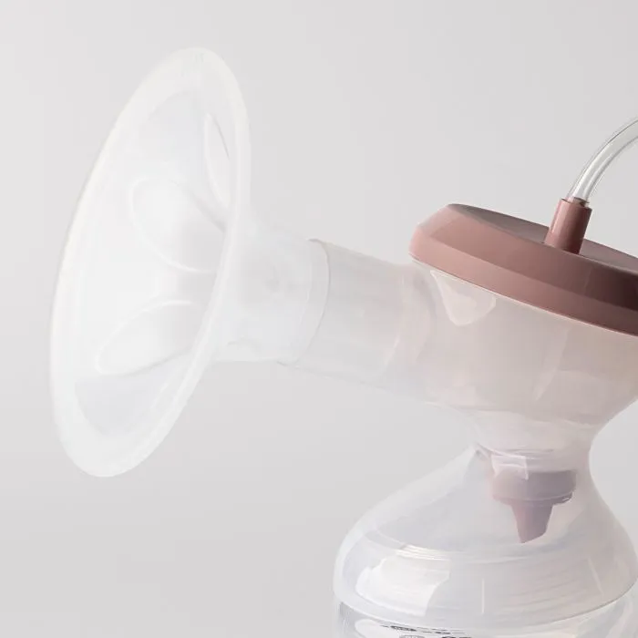 Side shot of an electric breast pump showing the hood.