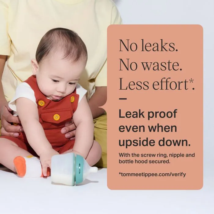 Baby sat on the floor with a silicone Natural Start bottle with text overlay of product messaging