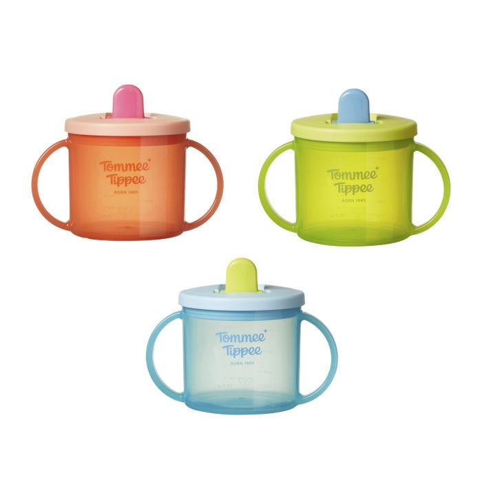 Three Tommee Tippee First Cups against a white background