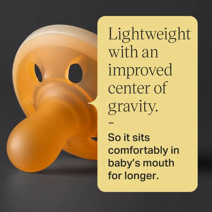 Close-up of a breast-like night pacifier and text about the lightweight design.