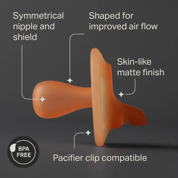 Side shot of a NightGlow pacifier with key feature pointers.