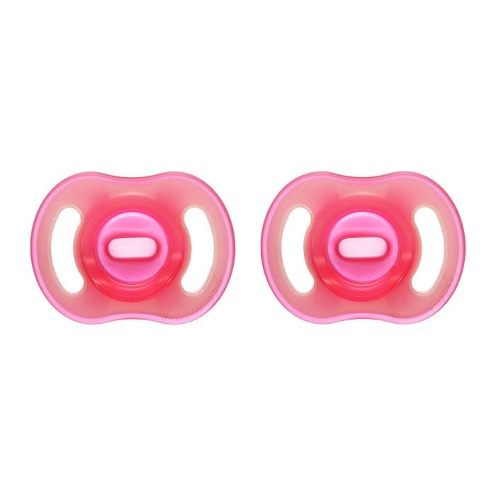 Ultra-light Night Glow soothers on a white background.