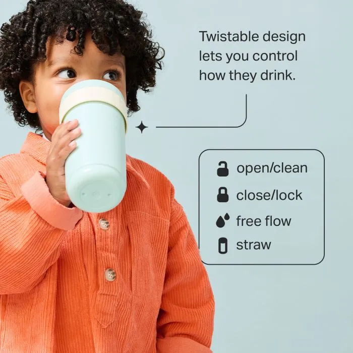Toddler drinking from a 3-in-1 convertible cup against a blue background with pointers to the product key features